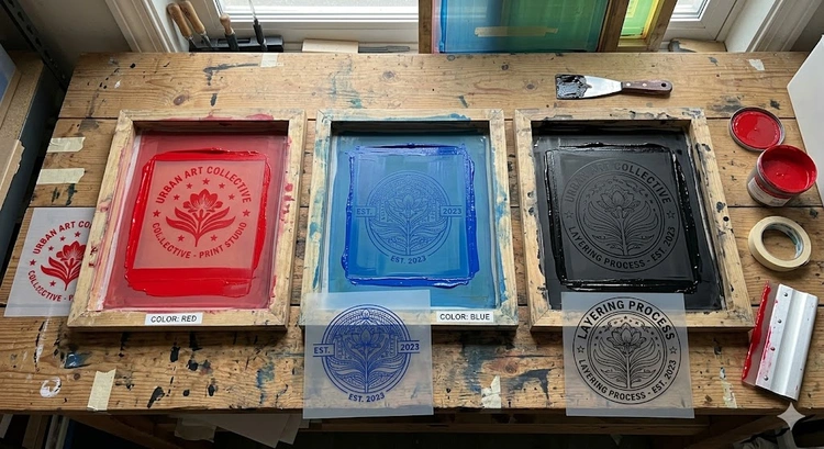 how to screen print multi color designs — multiple ink colors applied in layers on a t-shirt