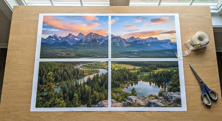 Tiled poster assembled from multiple printed pages laid out on a table